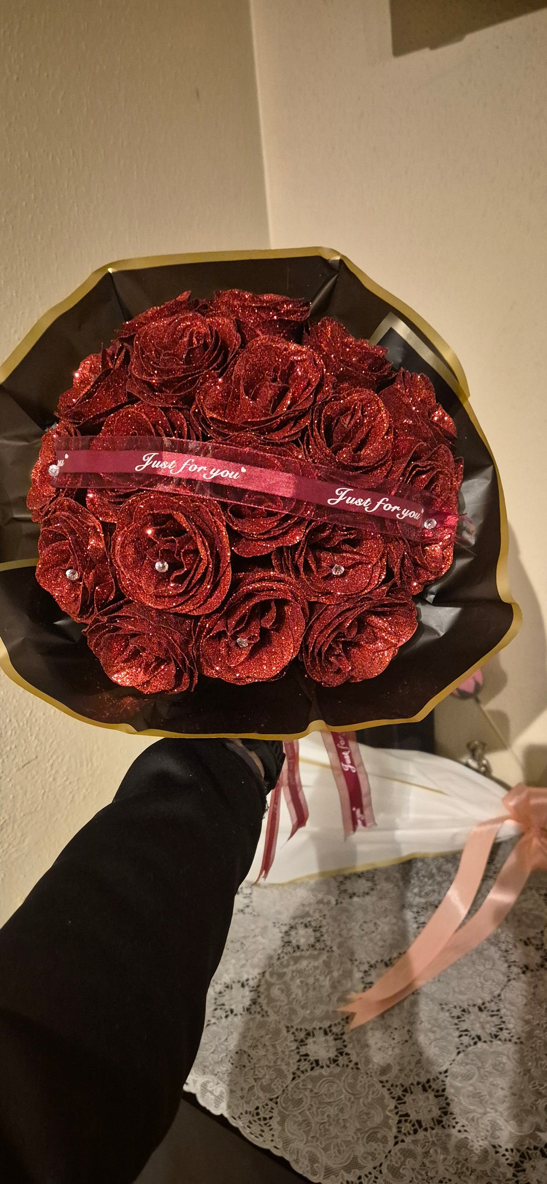 Red roses with an attractive black bouquet