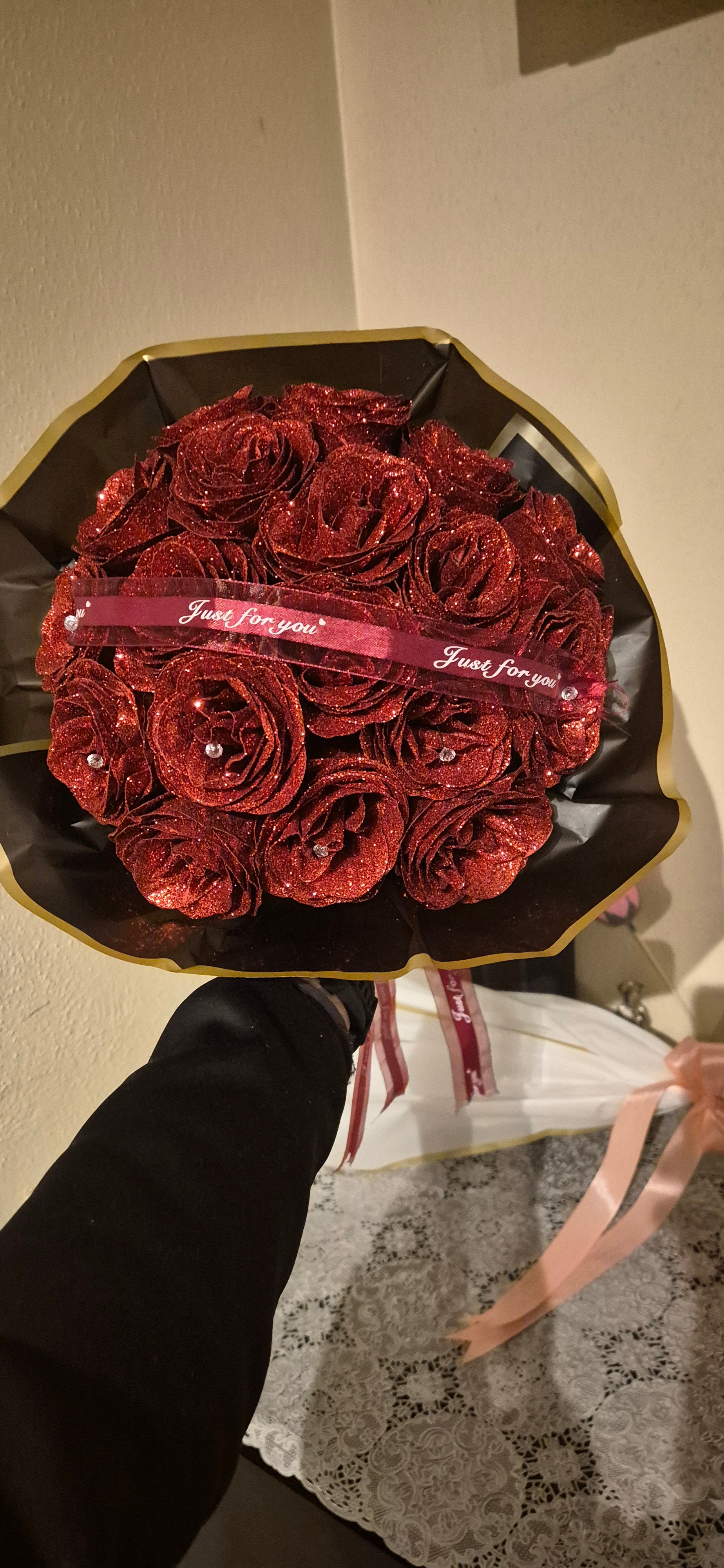 Red roses with an attractive black bouquet